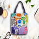 thumbnail image 2 of Bolso de hombro con estampado de dibujos animados para mujer, bolsa de lona de gran capacidad, versátil, organizador de compras para estudiantes, nuevos regalos, 2 of 5