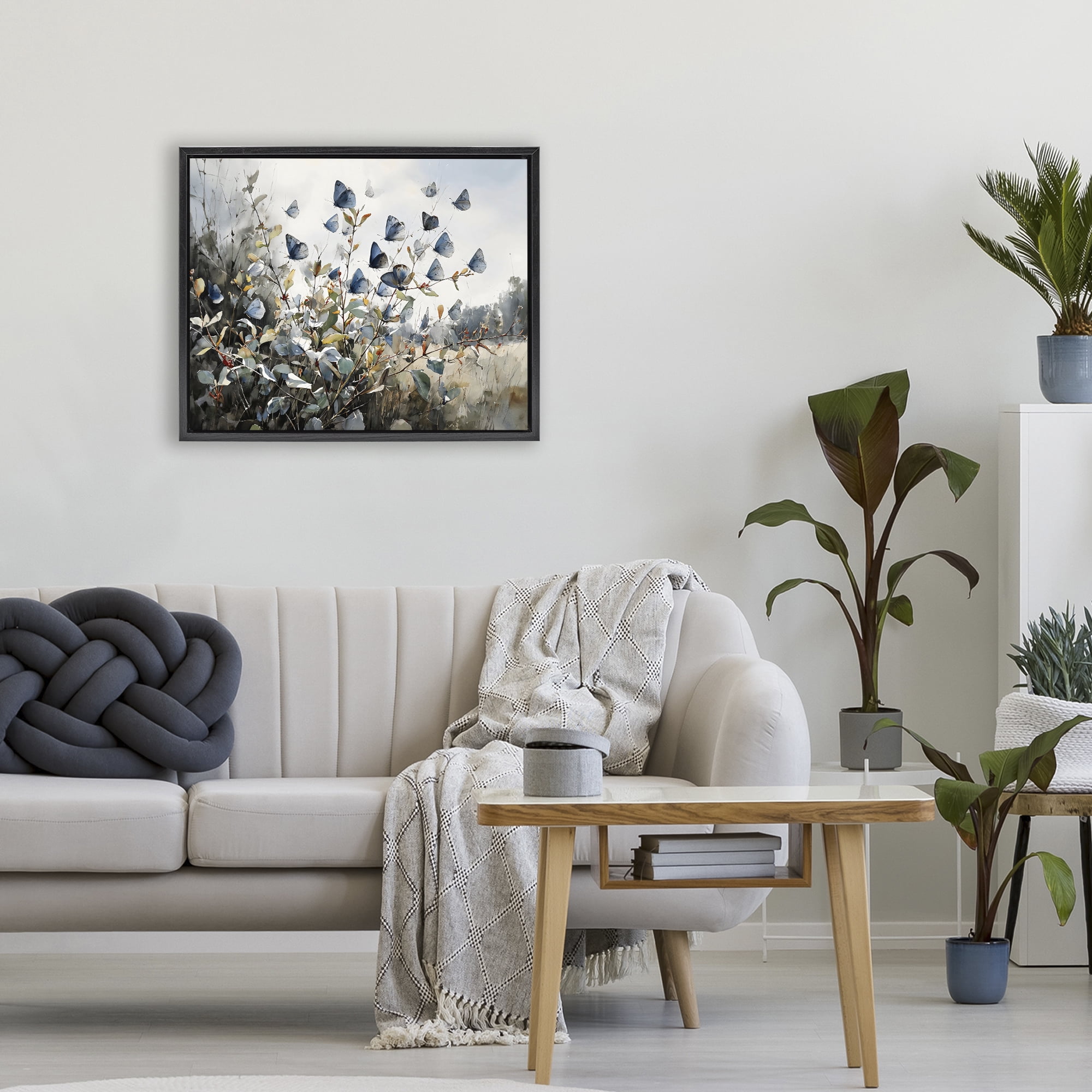 Stupell Industries Blue Butterflies Among Meadow Leaves Black Framed Floater Canvas Wall Art, design by Franklyn Gregory