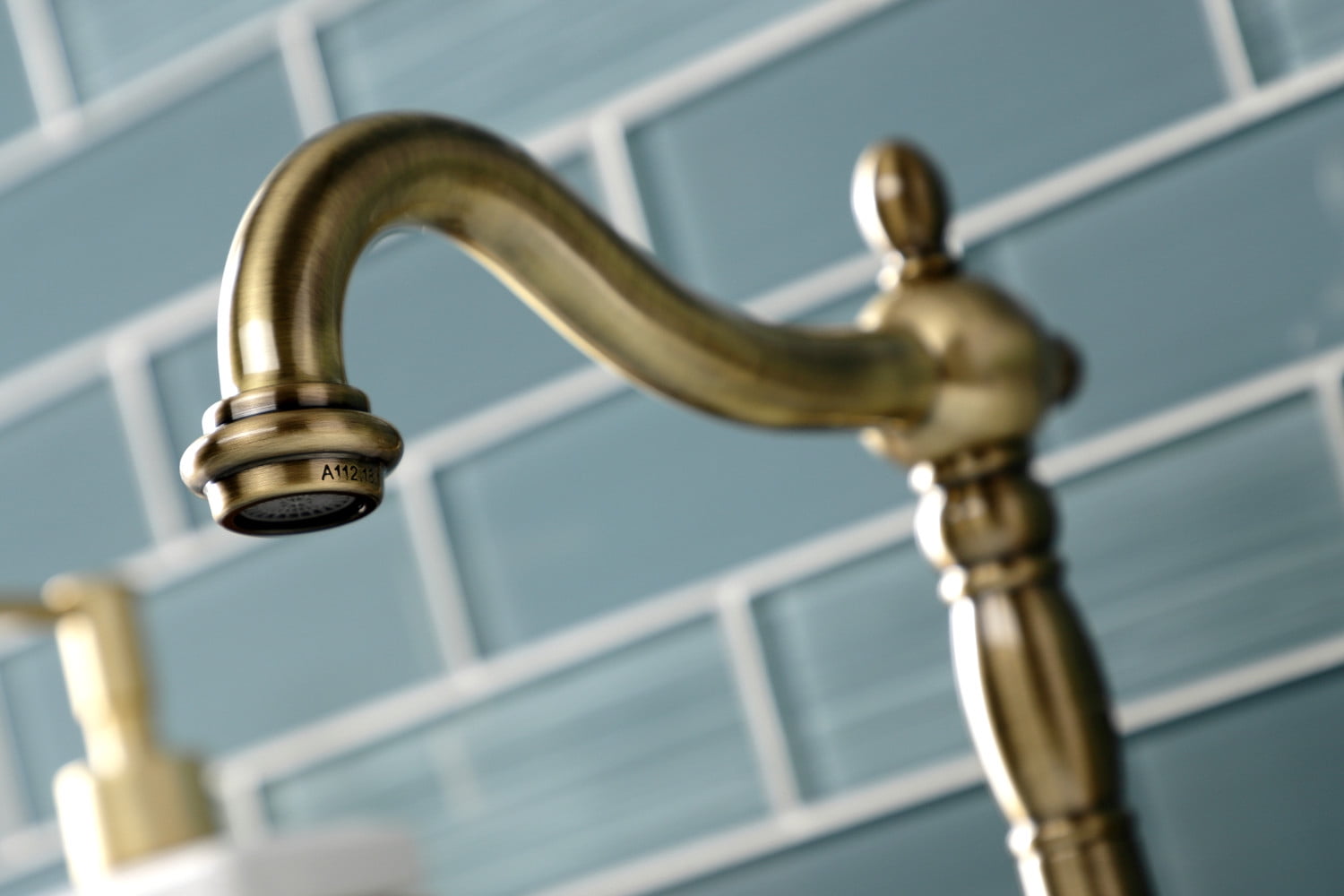 Kingston Brass KB1973AL Heritage Widespread Bathroom Faucet with Brass Pop-Up, Antique Brass