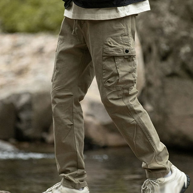 Pantalones largos de moda para hombre, casuales, de color sólido, con bolsillos y cremallera, cintura elástica, de poliéster.
