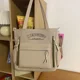 thumbnail image 3 of MBTI Lindo bolso de hombro vintage para mujer Bolso de mano con bordado de letras de gran capacidad Bolso de mano informal de moda estilo universitario para mujer, 3 of 5