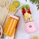 thumbnail image 4 of Licuadora eléctrica personal con vaso exprimidor de 4 cuchillas para batidos y smoothies para oficina Rosa, 4 of 7
