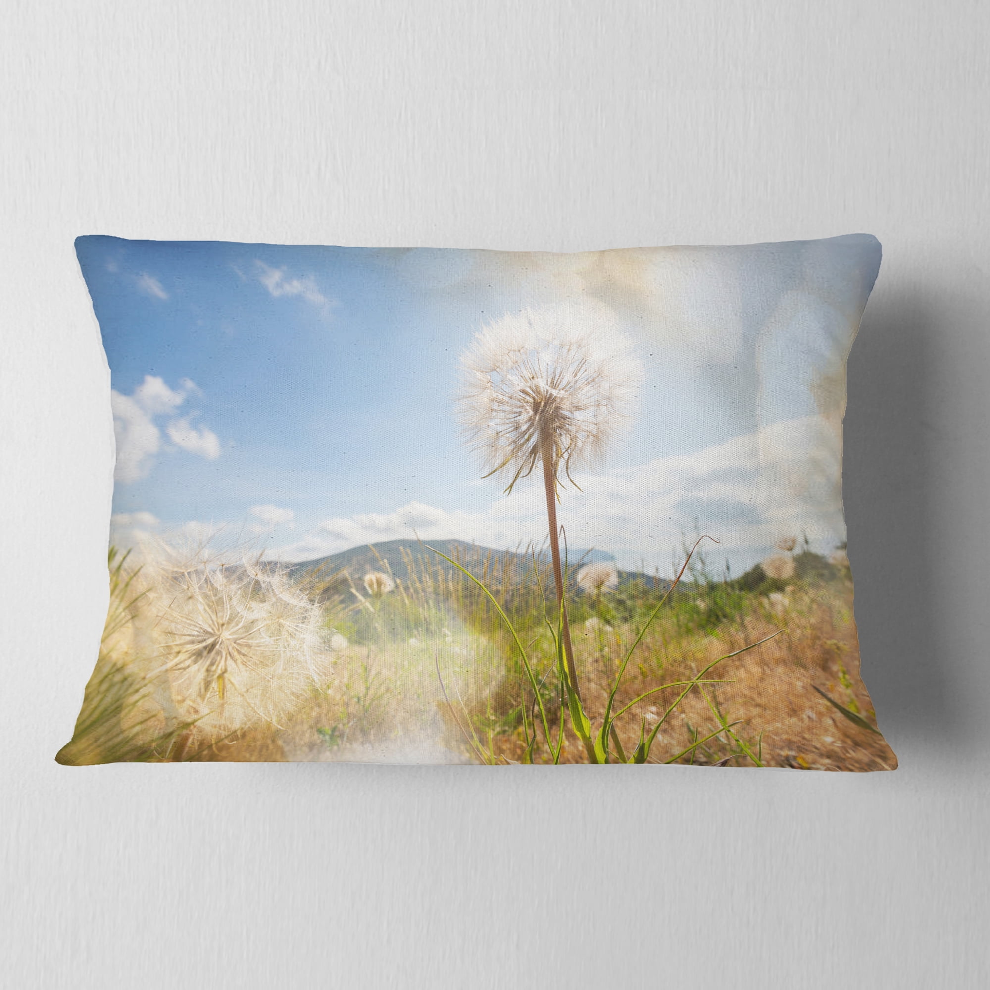 Designart Blooming Dandelion under Bright Sky - Floral Throw Pillow - 12x20