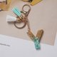 thumbnail image 1 of LLavero de 26 letras verdes de la A la Z para mujer, dijes de billetera, alfabeto inicial, dos colgantes de borla, llaveros de cadena, regalo de joyería, 1 of 4