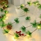 thumbnail image 5 of Luces Navideñas Decorativas: Guirnaldas de Luces, Piñas y Agujas de Pino, Campanas Decorativas., 5 of 6