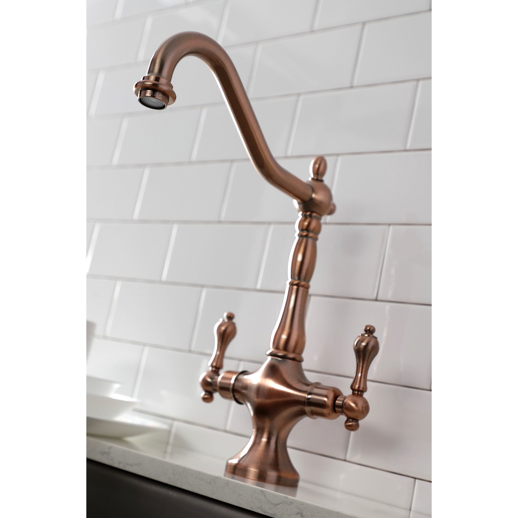 Kingston Brass KS177ALBSAC Heritage Two-Handle 2-Hole Kitchen Faucet with Brass Sprayer in Antique Copper