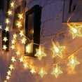 thumbnail image 1 of Guirnalda de luces con forma de estrella, 20 pies, 40 luces LED con forma de estrella, funciona con pilas, luces navideñas parpadeantes a prueba de agua para dormitorio, decoración navideña, 1 of 5