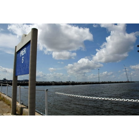 Brass Pier Base LAMINATED POSTER Pier 5 at Naval Station Norfolk is empty after 27 U.S. Navy ships departed the base ahead of Hurric Poster Print 24 x 36 ()