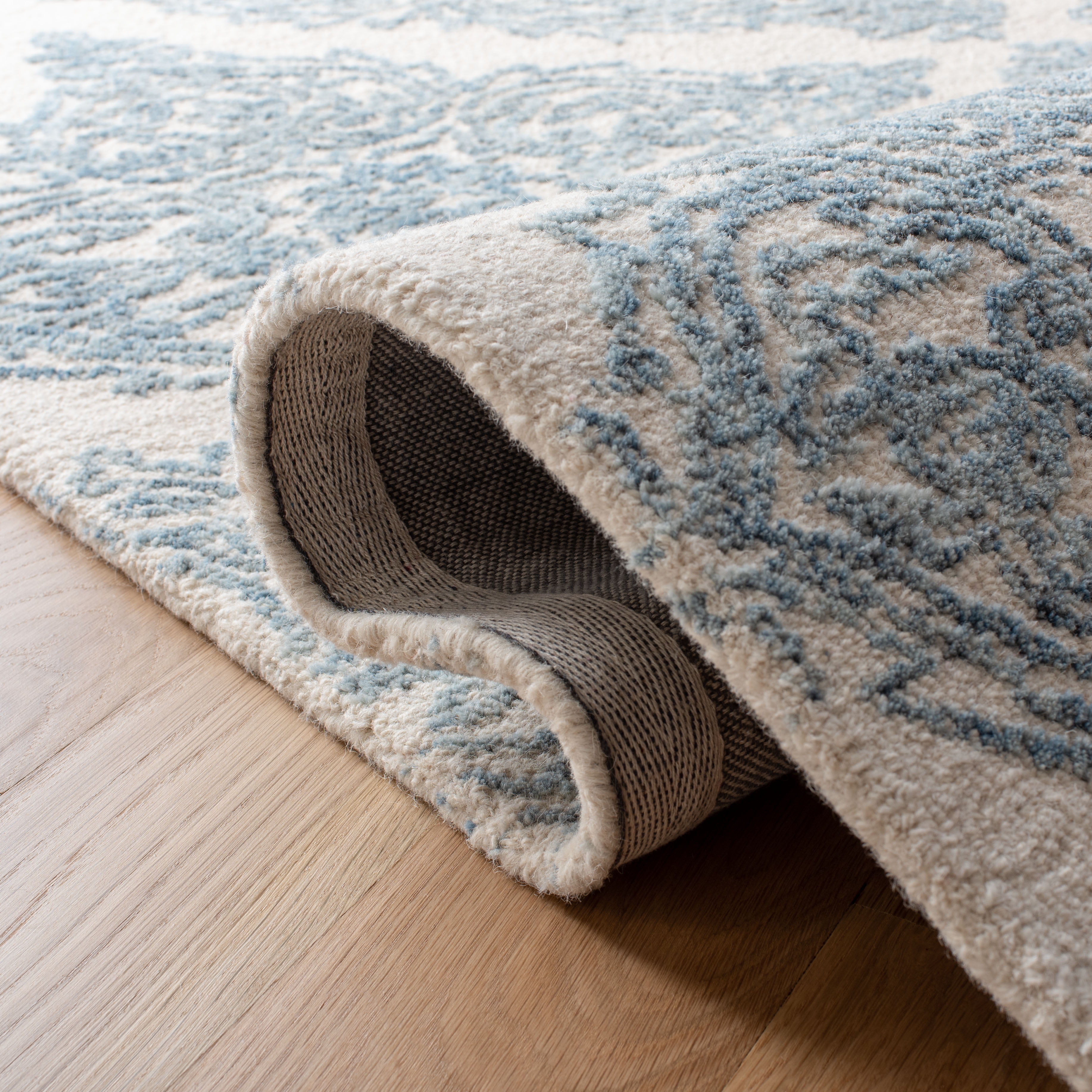SAFAVIEH Abstract Rachelle Floral Wool Area Rug, Ivory/Blue, 10' x 14'