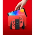 thumbnail image 2 of Nintendo Switch OLED with Mario Red Joy-Con (International Edition) Bundle with 3 Month Nintendo Switch Online Membership & 25 GC, 2 of 5