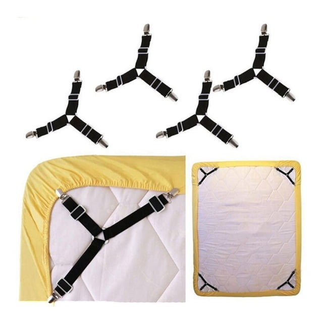 paquete de 4 sujetadores para sábanas, tirantes elásticos triangulares ajustables, correas de sujeción para sábanas, fundas de colchón, cojín de sofá (negro) cuatro sujetadores triangulares negros con bandas elásticas ajustables, hebillas de metal y clips con inserción plástica; mostrados en las cuatro esquinas de una funda de colchón para mantener la sábana tensa; también adecuados para fijar mantas o fundas de cojín.