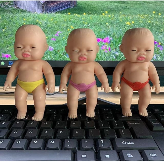 Muñeca de palma de descompresión, muñeca de rebote lento con música, juguete de descompresión de muñeca negra