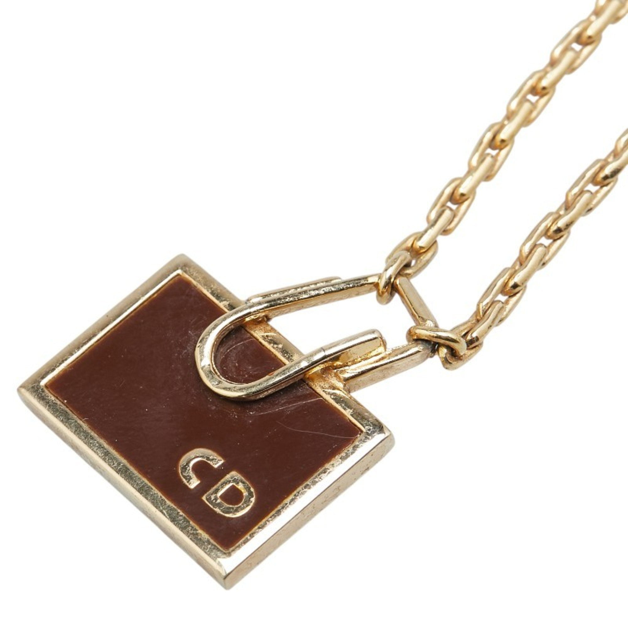 Pre-Owned Christian Dior Dior logo plate chain pendant necklace in gold and brown.... (Good)