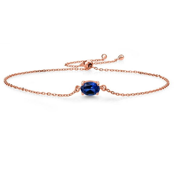 Gem Stone King 18K Rose Gold Plated Silver Blue Created Sapphire Solitaire Bracelet for Women (1.00 Cttw, Oval Cut 7x5mm)
