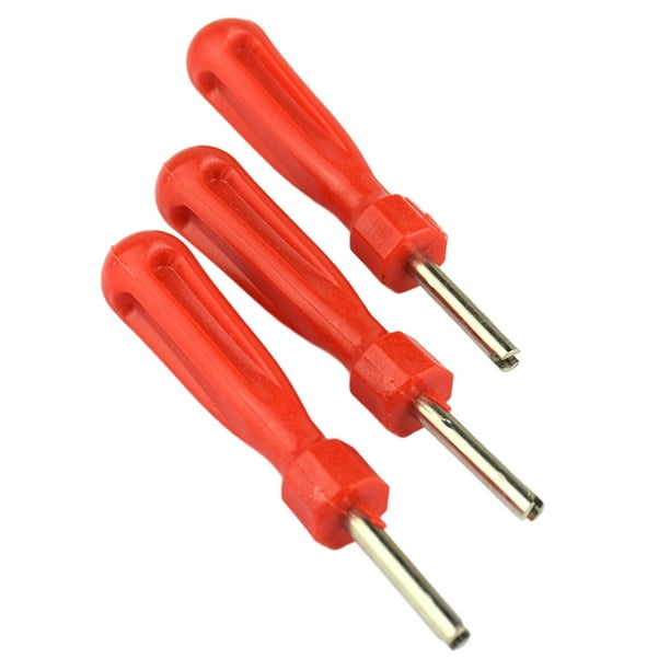 Herramientas para instalar y quitar el núcleo de los neumáticos de coche. Herramienta para atornillar la boquilla del neumático. Destornillador.