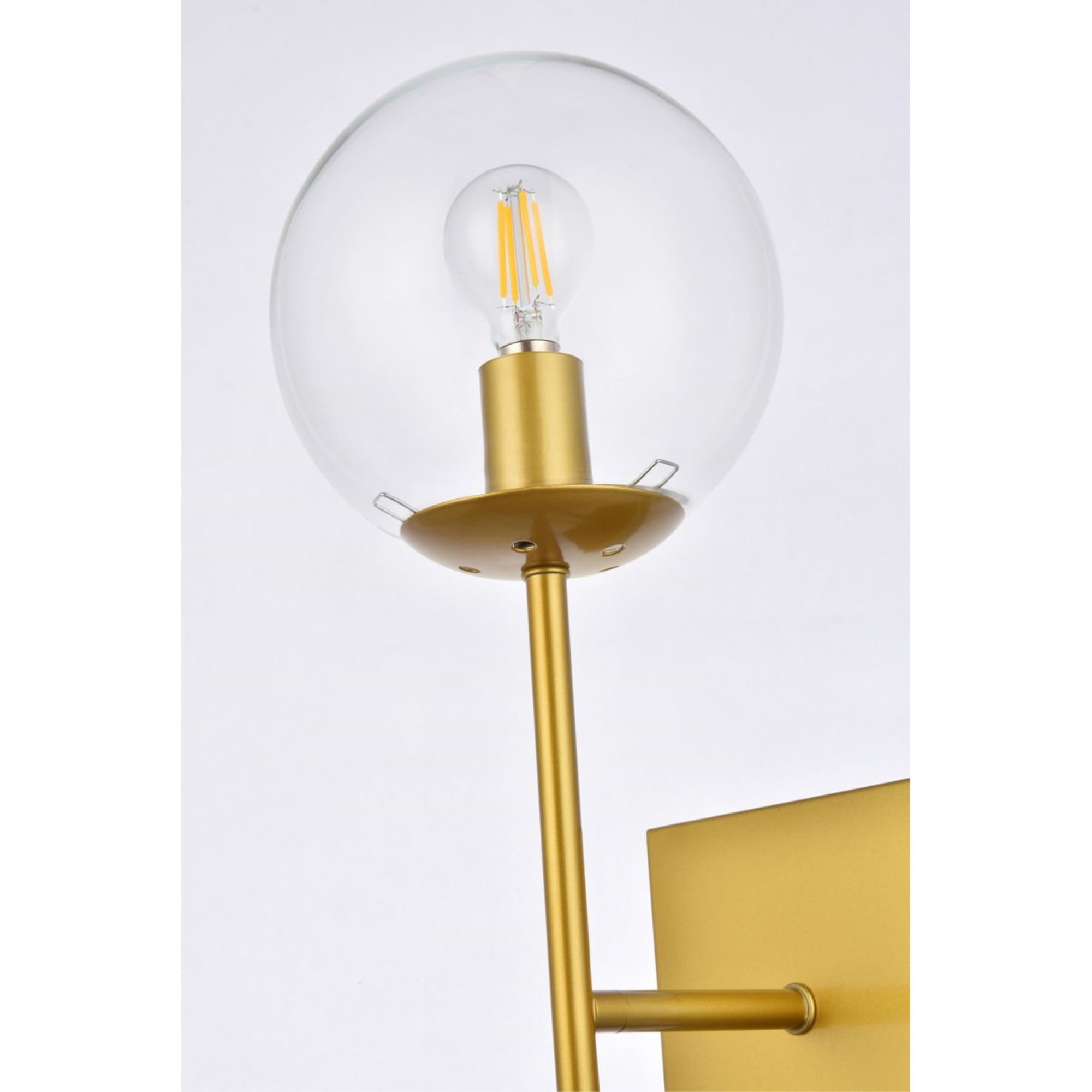 Neri 1 light brass and clear glass wall sconce