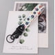 thumbnail image 4 of LLavero de pico de águila con figuras de Anime, cordón corto, cuerda para teléfono, soporte para insignia, colgante USB, accesorios para llaves portátiles, regalo, venta al por mayor, 4 of 4