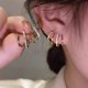 thumbnail image 4 of Pendientes con forma de garra Yashi 64510 dorado, 4 of 5