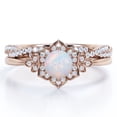 thumbnail image 1 of JeenMata Anillo de Bodas con Banda Trenzada Infinita de Moissanita y Ópalo Etíope de Talla Redonda de 1,5 Quilates con Bisel de Halo de Flores Engastado en Oro Rosa de 18 K sobre Plata, 1 of 6