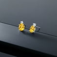 thumbnail image 4 of Gem Stone King 14K White Gold Yellow Citrine and White Topaz Earrings for Women (2.76 Cttw, Gemstone November Birthstone, Oval 8X6MM, Round 2.5MM), 4 of 5