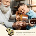 thumbnail image 3 of CIMAXIC Children Small Size Musical Instruments Imitated Ukulele Mini Guitar Playing Toy with Four Strings (39cm, Beige),15.35"X4.92"X1.57", 3 of 5
