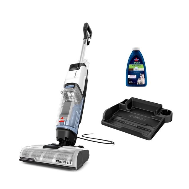 CrossWave Edge corded wet/dry vacuum cleaner with clear water tank, pet multi-surface cleaning solution bottle, and black accessory tray.