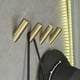 thumbnail image 1 of Juego de 4 ganchos de pared en oro cepillado para servilletas y albornoces., 1 of 5