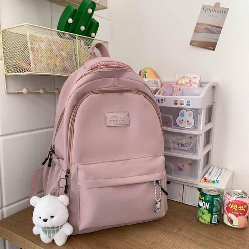 Student Japanese large-capacity backpack Teenagers simple and versatile backpack Unisex polyester material Doll decoration