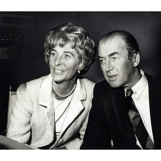 James Stewart and Gloria Hatrick McLean at a party Photo Print