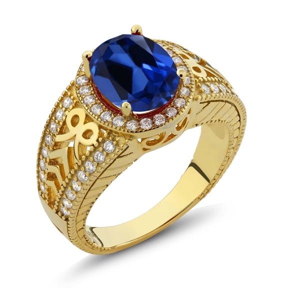 Gem Stone King 4.12 Ct Oval Blue Created Sapphire 18K Yellow Gold Plated Silver Ring (Size 5)