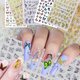 thumbnail image 1 of 895+pcs Butterfly Nail Art Stickers Decals, Laser Metallic Gold and Silver 3D Butterflies Acrylic Self Adhesive Decals Holographic Nail Art Set (12 Sh, 1 of 4
