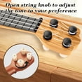 thumbnail image 4 of Kids Ukulele Guitar Toy, 4-String Mini Musical Instrument, Beginner Educational Toy with Nylon Strings, Portable Durable Plastic, Includes Plectrum & Sheet Music, 4 of 6