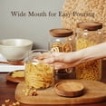 thumbnail image 3 of Labina Glass Storage Container Airtight Food Jars Kitchen Canister with Wood Lids, 20 Oz Wide Mouth Pantry Organization Glass Jar for Flour, Sugar, Cookie, Spagetti, Nuts and Candy (2 Pack), 3 of 6
