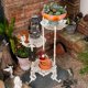 thumbnail image 4 of Sungmor Soporte para Plantas de Hierro Fundido Vintage de 3 Niveles, diseño de mariposas y flores en acabado blanco antiguo, estante metálico resistente de 28" para interior y exterior., 4 of 8