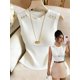 thumbnail image 3 of Top Sin Mangas Blanco Con Detalles Negros Y Botones Dorados Multicolor-3, 3 of 21