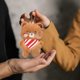 thumbnail image 4 of Adorno colgante con peluche de oso de dibujos animados que chirría, un amigo suave para los niños, 4 of 5