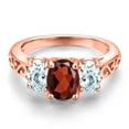 thumbnail image 3 of Gem Stone King 18K Rose Gold Plated Silver Red Garnet and Sky Blue Aquamarine Filigree Style 3 Stone Ring for Women (2.50 Cttw, Oval 8X6MM and 6X4MM) (Size 6), 3 of 6