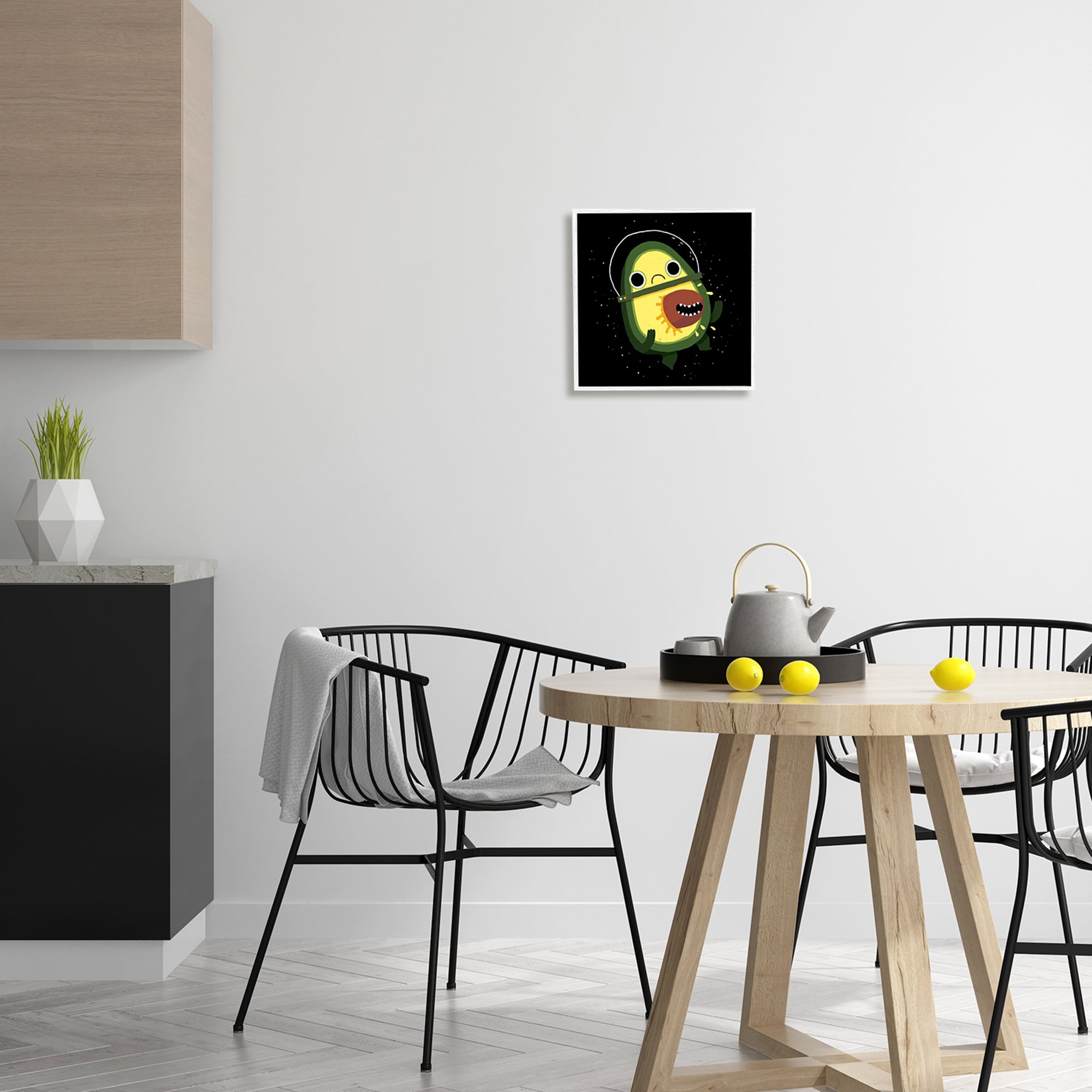 Stupell Industries Green Frowning Avocado Seed Outer Space Astronaut Framed Wall Art, 12 x 12, Design by Michael Buxton