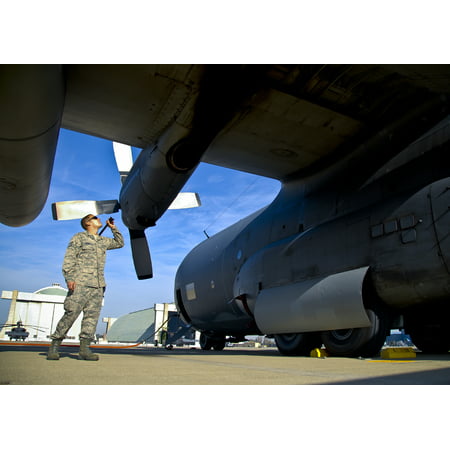 LAMINATED POSTER U.S. Air Force Tech. Sgt. Christopher Dominguez, assigned to the 129th Rescue Wing Maintenance Squad Poster Print 24 x