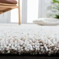 thumbnail image 4 of SAFAVIEH Ultimate Atanas Solid Plush Polyester Shag Area Rug, Sand/Ivory, 8' x 10', 4 of 6