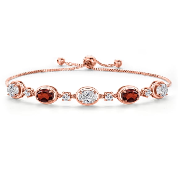 Gem Stone King 18K Rose Gold Plated Silver White Lab Grown Diamond and Red Garnet Bracelet for Women | 4.10 Cttw | Gemstone April Birthstone | Oval 7X5MM | Fully Adjustable 9 inch