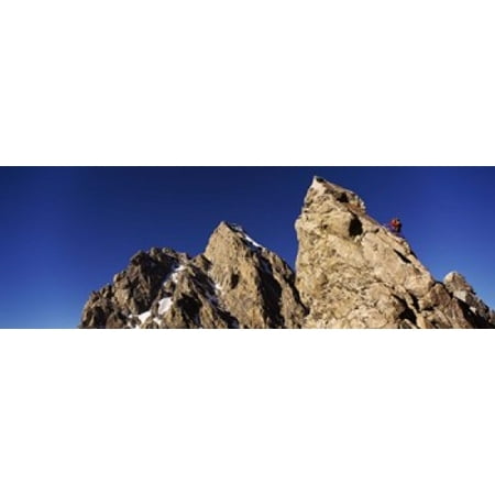Low angle view of a man climbing up a mountain Rockchuck Peak Grand Teton National Park Wyoming USA Canvas Art - Panoramic Images (36 x 12)