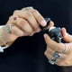thumbnail image 3 of Bálsamo Labial Rebels Refinery Negro Forma de Calavera con Vitamina E y Aceites de Coco y Almendra -, 3 of 8