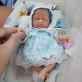 thumbnail image 3 of Muñeca pequeña de silicona Newtotlove de 7 cm con accesorios de alimentación, 3 of 5