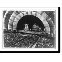 Historic Print, [Interior of Radio City Music Hall in New York City, showing audience, the Rockettes on stage, and the Music Hall Symphony Orchestra in the pit].photo by Cosmo-Sileo, N.Y., 16" x 20"