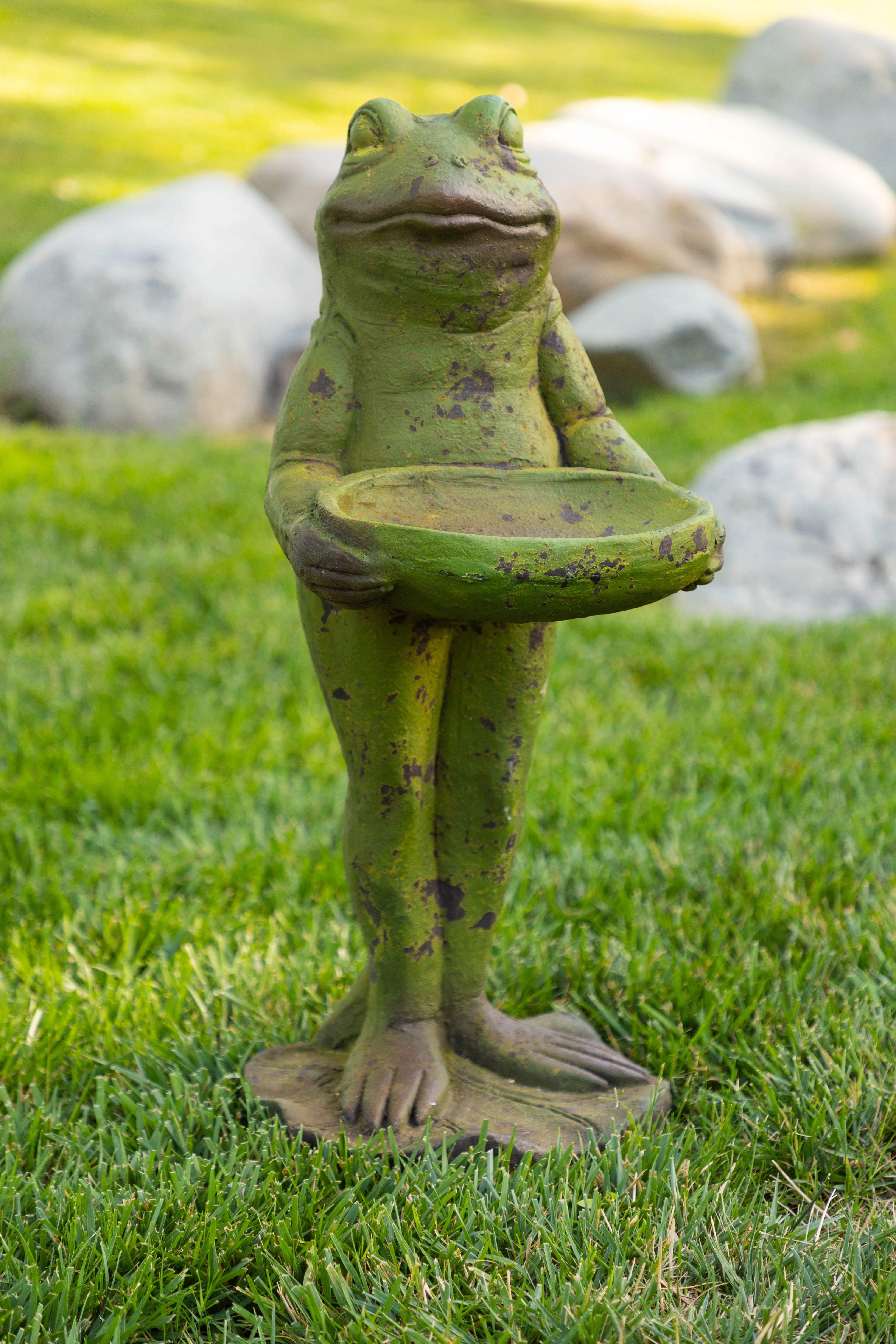 reclining frog statue