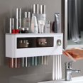 thumbnail image 2 of Soporte para cepillo de dientes multifunción para baño, artículo para el hogar, exprimidor automático de pasta de dientes, estantes de almacenamiento, accesorios de baño (cuatro tazas grises) JM, 2 of 5