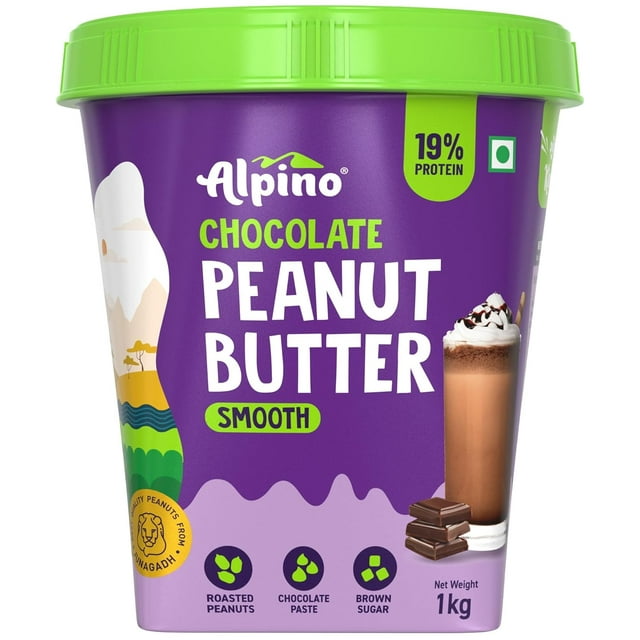 ALPINO Chocolate Peanut Butter Smooth in a 1 kg container, featuring 19% plant-based protein. Made with roasted peanuts, chocolate paste, brown sugar, and sea salt, this creamy spread is gluten-free, vegan-friendly, and contains zero trans fat and cholesterol. The packaging highlights its rich and creamy texture, ideal for use as a topping on toast, with oats, or as a classic bread spread. The container is purple with a green lid, showcasing product details and an image of a chocolate drink.