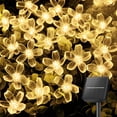 thumbnail image 1 of Guirnalda de luces solares Brightown 60 LED con forma de flor, color blanco cálido, 1 of 7