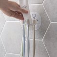 thumbnail image 5 of Soporte para cepillo de dientes sin perforaciones para inodoro, estante de almacenamiento de cepillos de dientes poroso para niños, soporte creativo para pasta de dientes montado en la pared para baño, 5 of 5